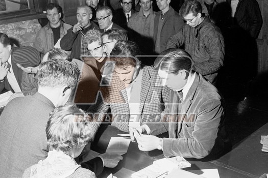 Ronnie Mc Cartney, Terry Harryman , Reggie Tilson ( with glasses) beside man smoking